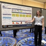 Kyra Bowden and her poster at NANS2026 meeting